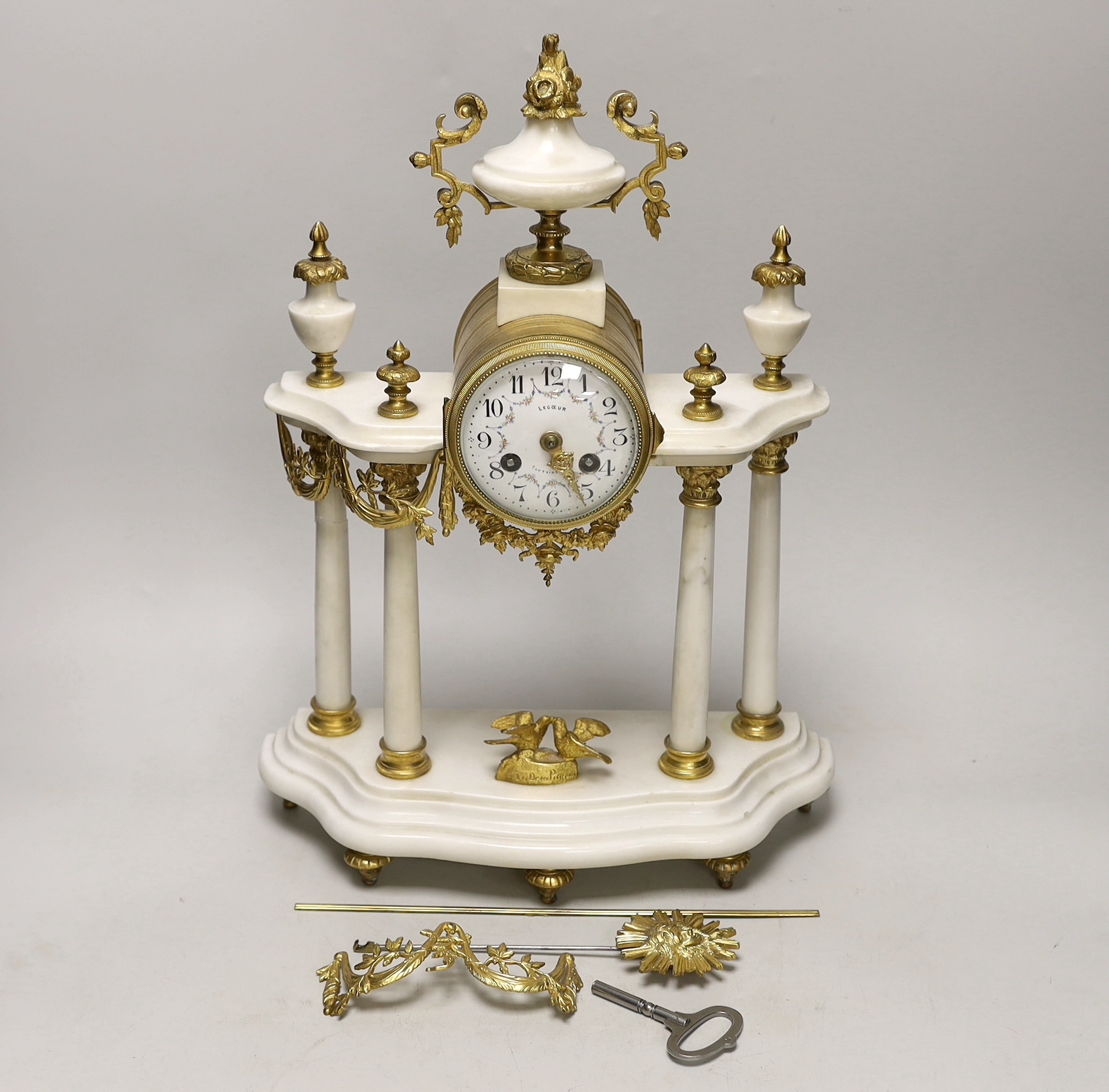 A 19th century French white marble mantel clock, 42cm